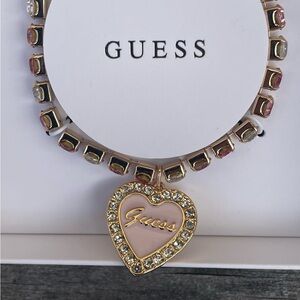 Guess Gold and Pink Heart Charm Bracelet with Gem Accents